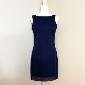 Alyn Paige deep blue sleeveless cocktail dress